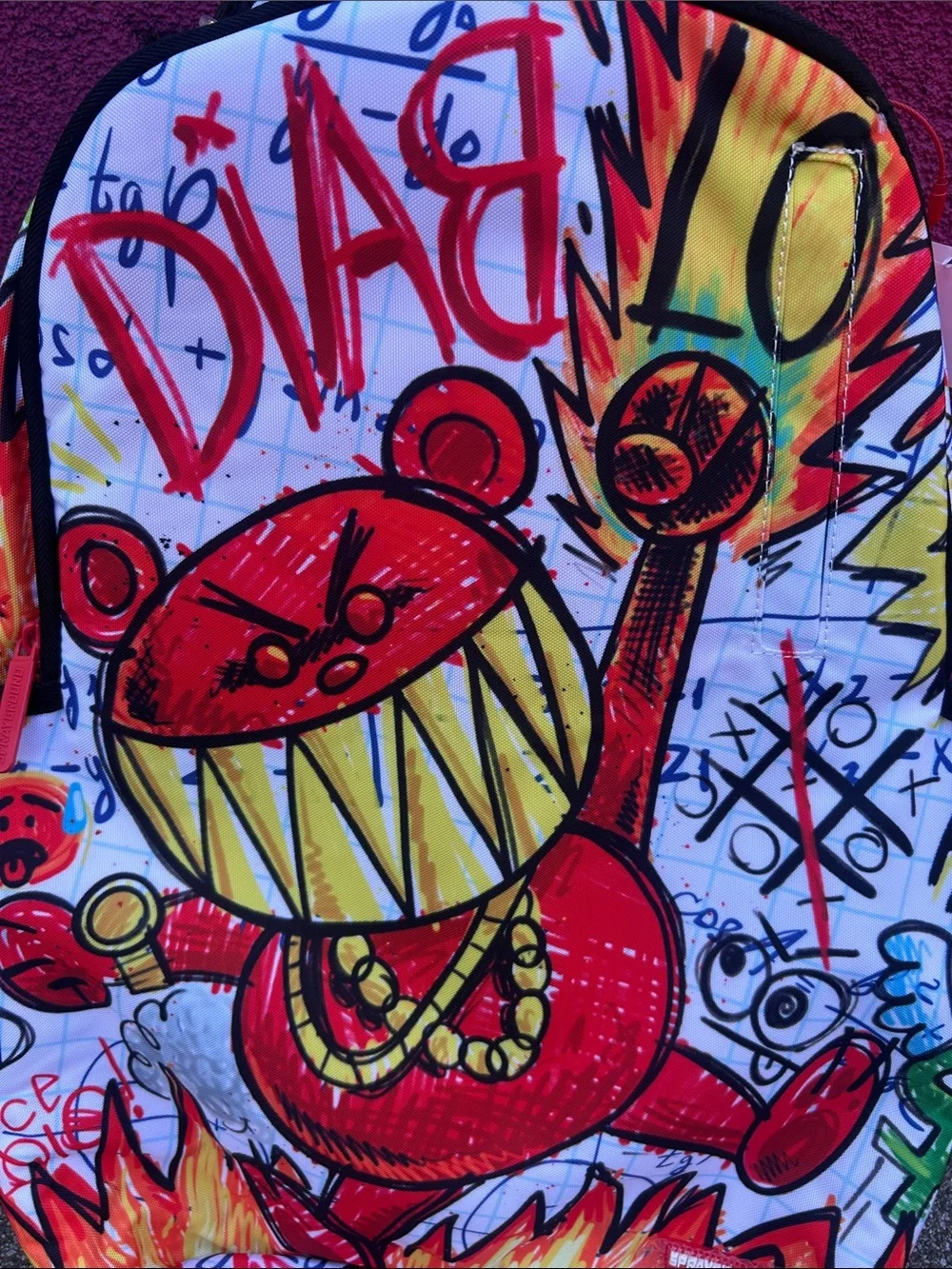 Sprayground Red, Yellow & Green Graffiti Backpack
